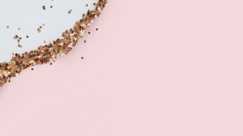 Gold glitter on pink background