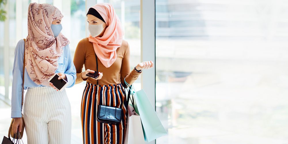 Muslim girls in face mask shopping at the mall in new normal