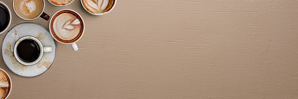 Mixed coffee cups on a beige background