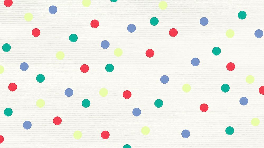 Polka dot colorful artsy on textured wallpaper