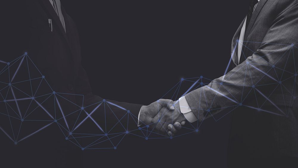 Business partners handshake technology corporate business concept