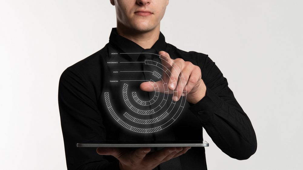 Futuristic digital information presentation by a businessman in black shirt