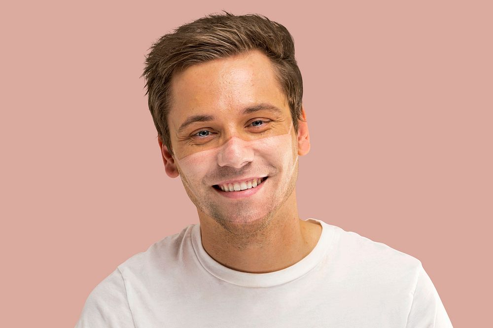 Man face with mask tan line on pink background