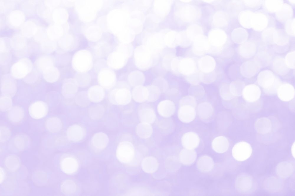 Purple defocused glittery background design