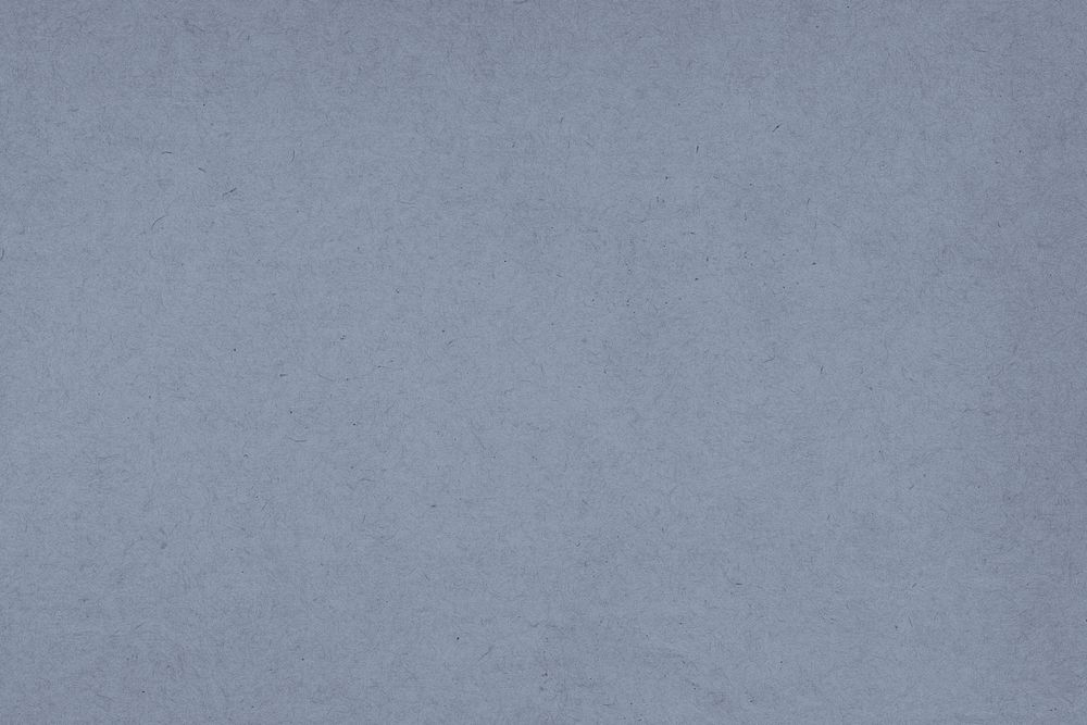 Plain blue paper textured background