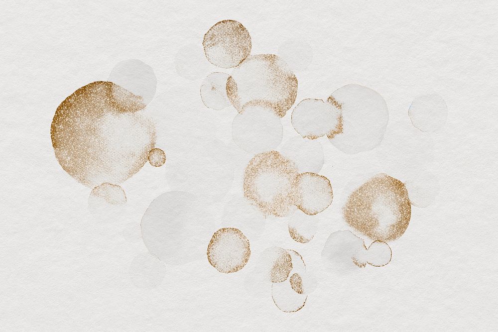 Glittery watercolor stain beige background
