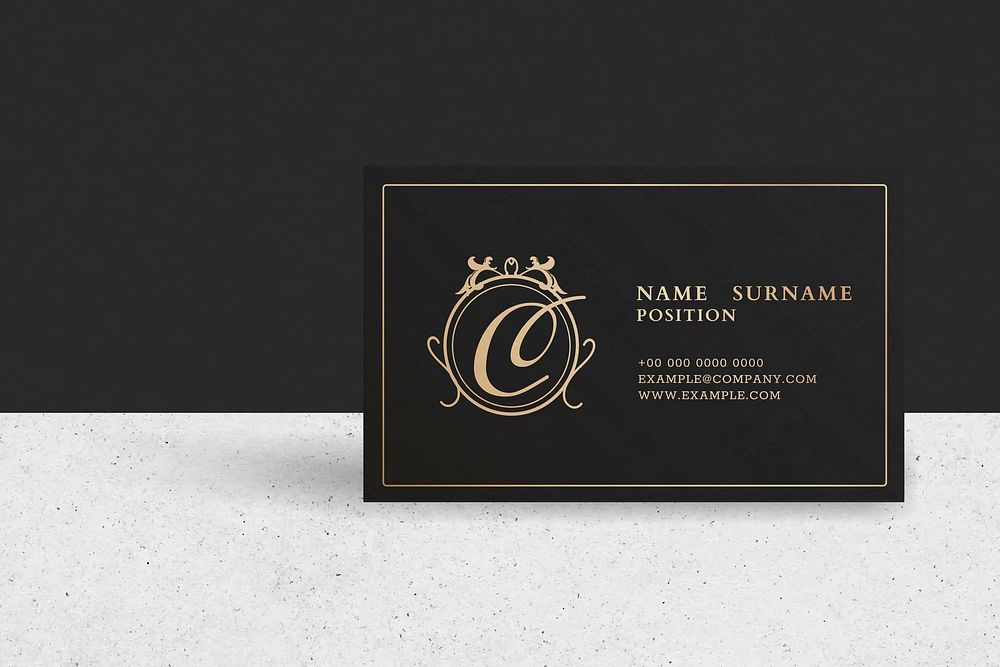 Luxury business card mockup vector in black and gold tone