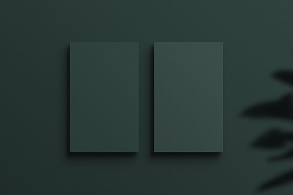 Blank green business cards with leaf shadow
