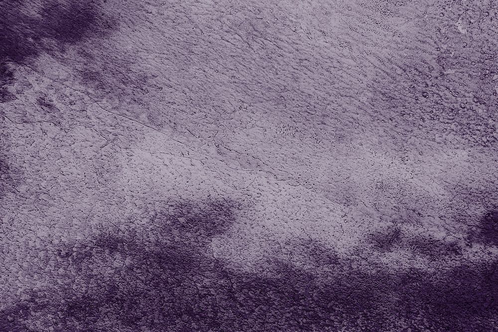 Purple paint grunge textured concrete background