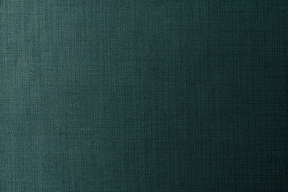 Plain green fabric textured background