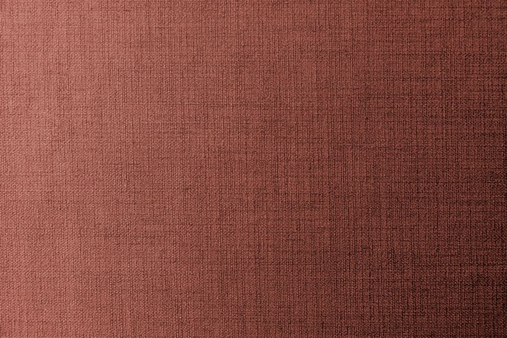 Plain orangish brown fabric textured background vector