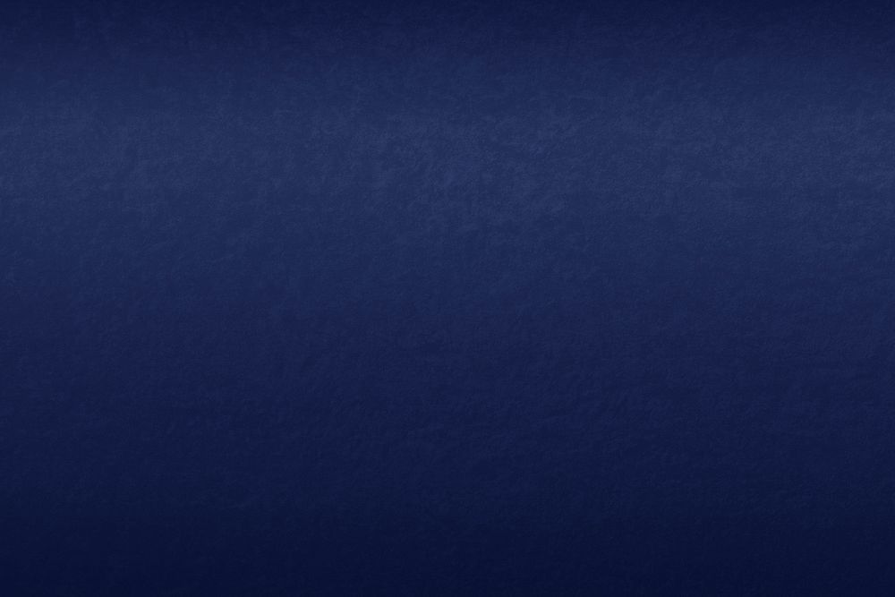 Smooth navy blue concrete wall background