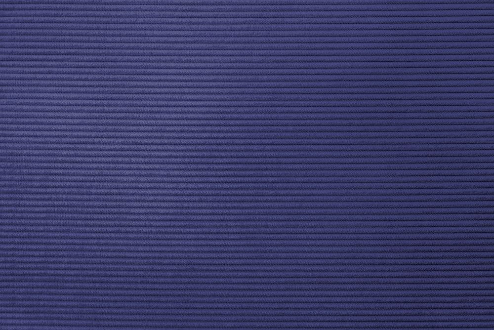 Purple corduroy fabric textured background