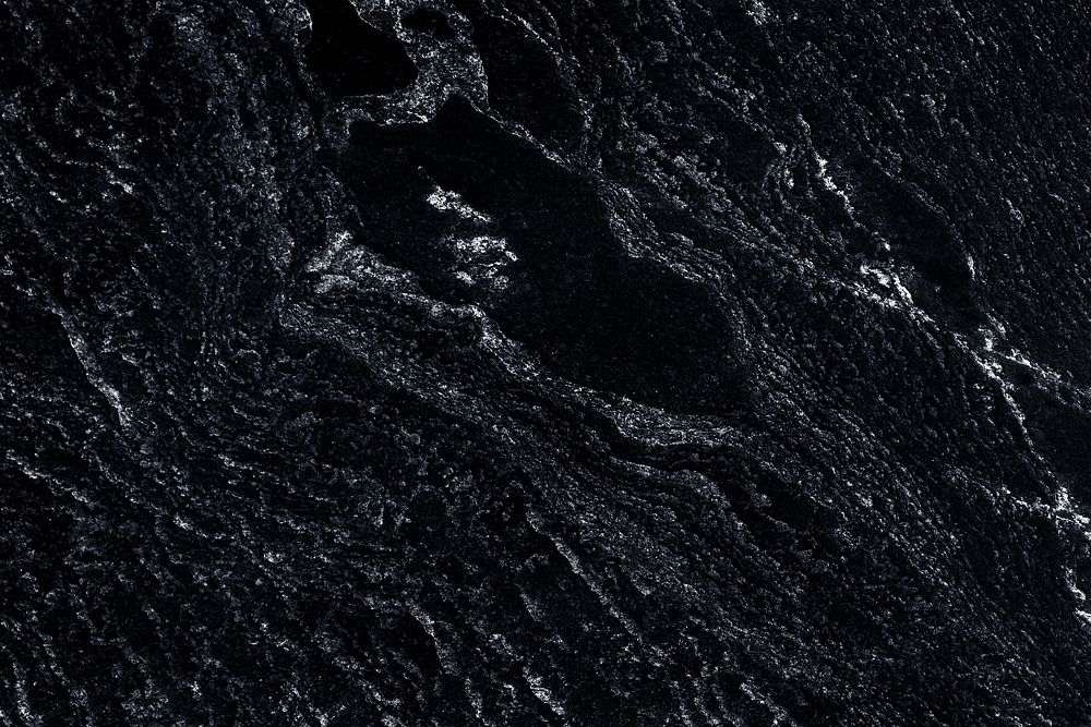 Dark black rough surfaced background