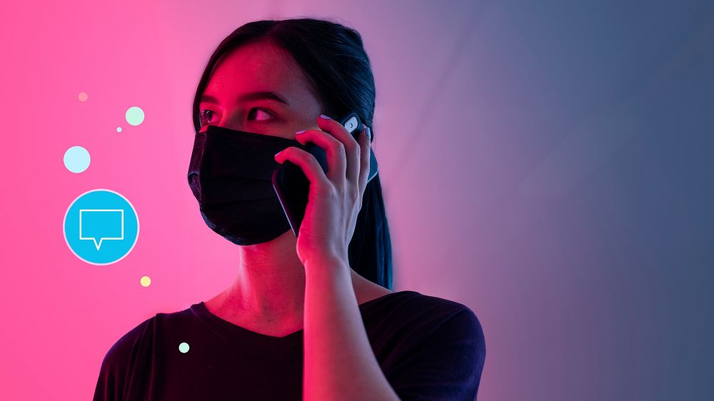 Networking during social distancing woman wearing mask talking on the phone