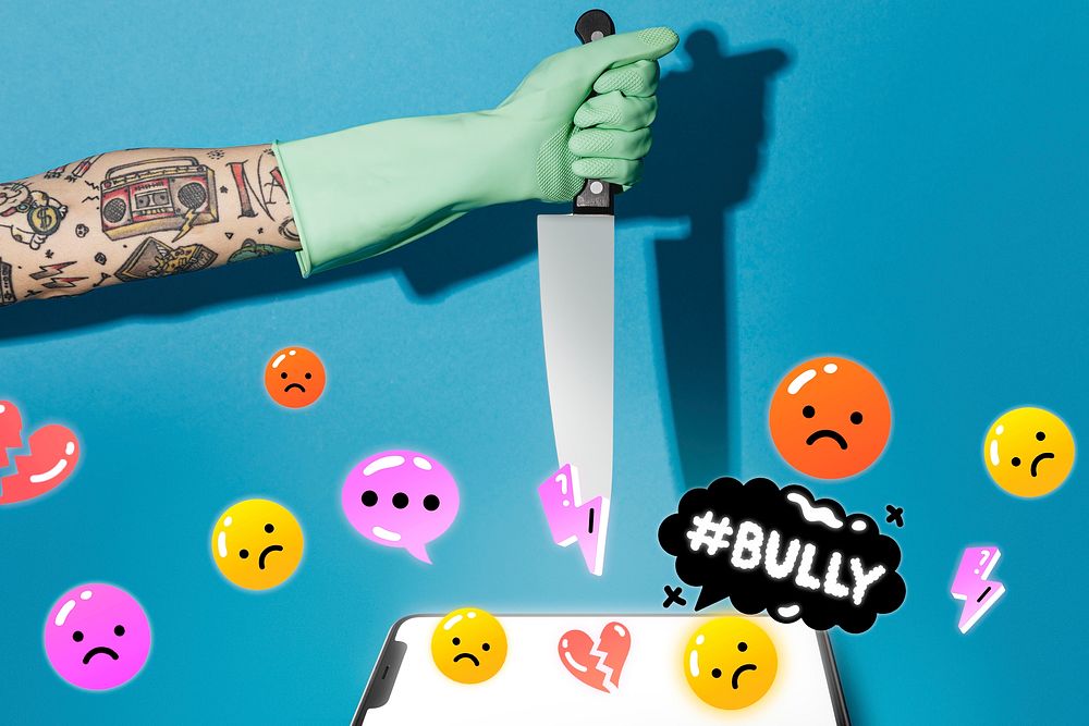 Tattooed man holding knife for cyberbully campaign