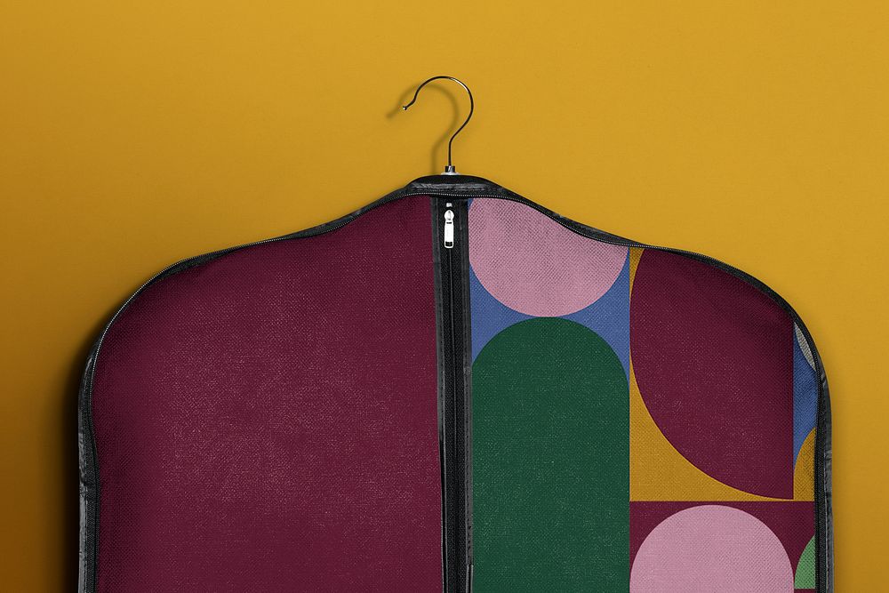 Colorful suit cover in retro style with design space
