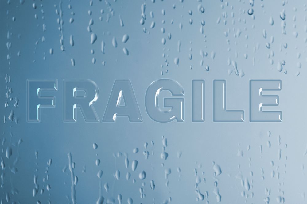 Fragile typography in wet glass font