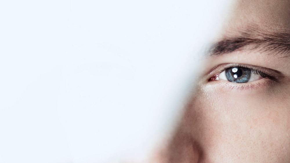 Thoughtful man looking through glass background business vision