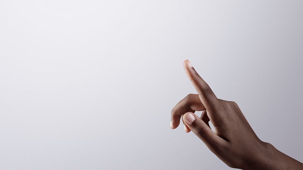 Woman&rsquo;s finger pointing on gray border background
