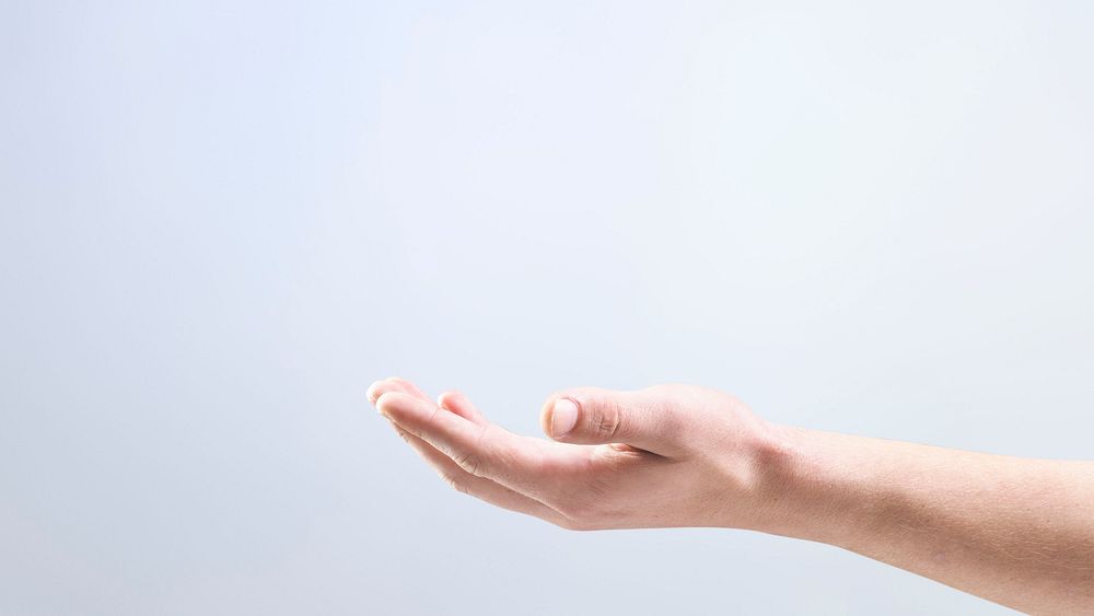 Woman&rsquo;s hand background showing invisible object gesture