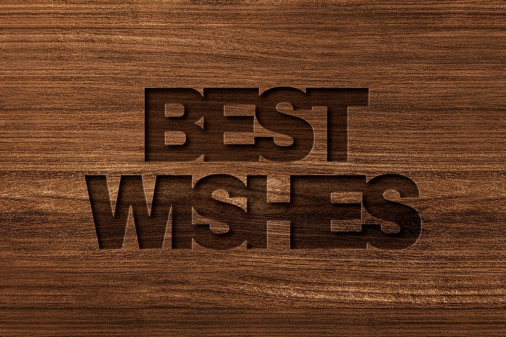Best wishes engraved wood typography on wooden background