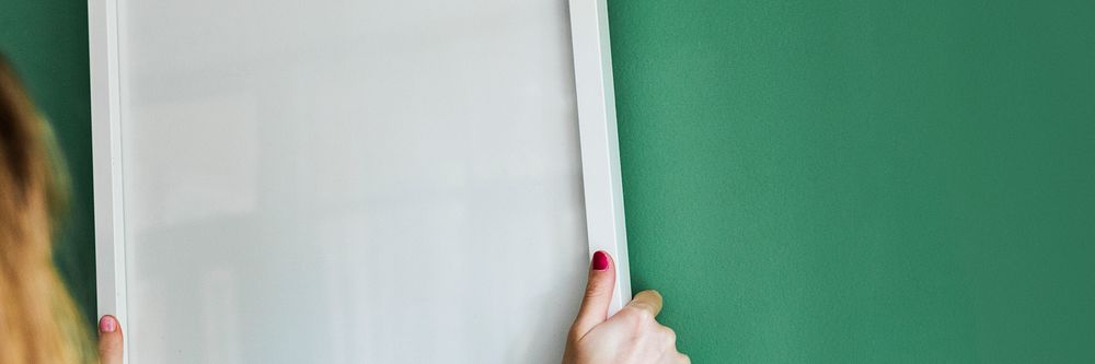 Blank frame mockup on a green wall website banner template