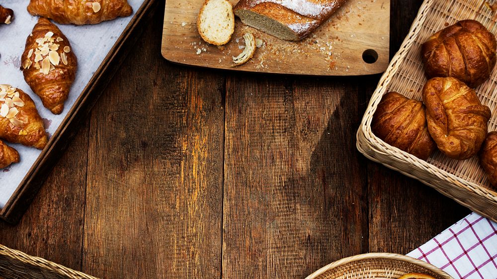 Croissants on a wooden background website banner template