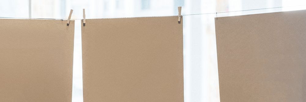 Hanging brown papers website banner template