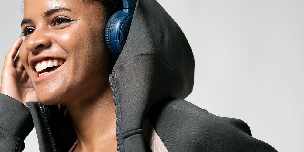 Sporty woman listening to music twitter post banner