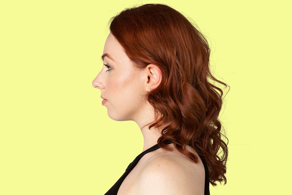 Red headed woman in a profile shot mockup 
