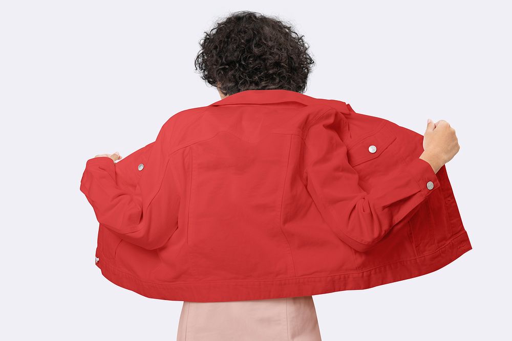 Stylish woman in red denim jacket for apparel shoot rear view