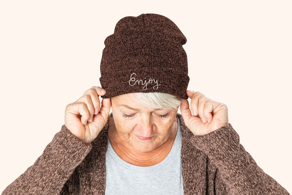 Senior woman in red beanie for winter apparel