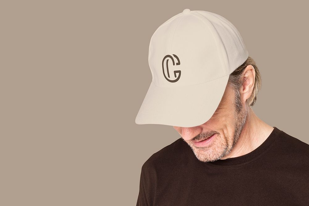Man in beige cap with C logo for men&rsquo;s apparel shoot
