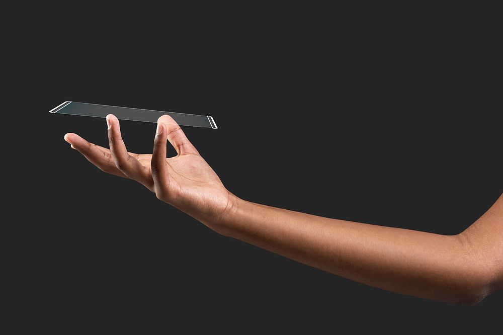 Hand presenting transparent phone futuristic technology