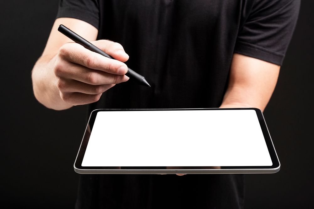 Businessman holding tablet and writing on screen with stylus social media cover