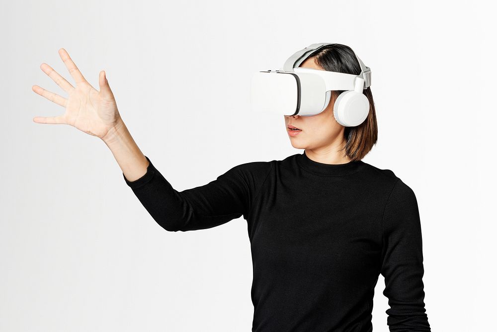 Woman with virtual reality headsets on invisible screen