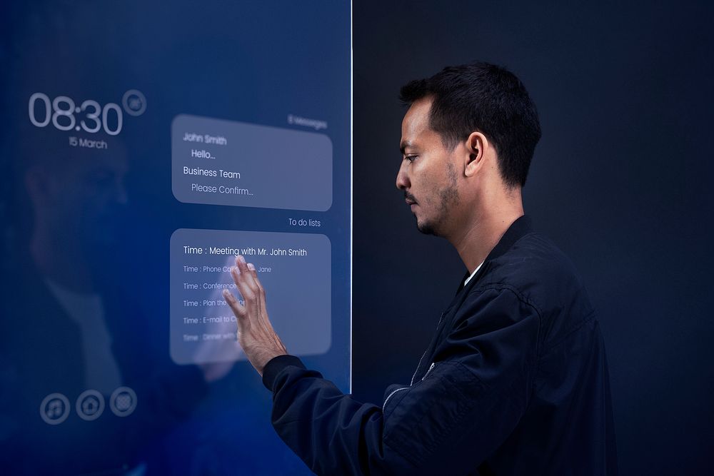Man touching virtual screen futuristic technology
