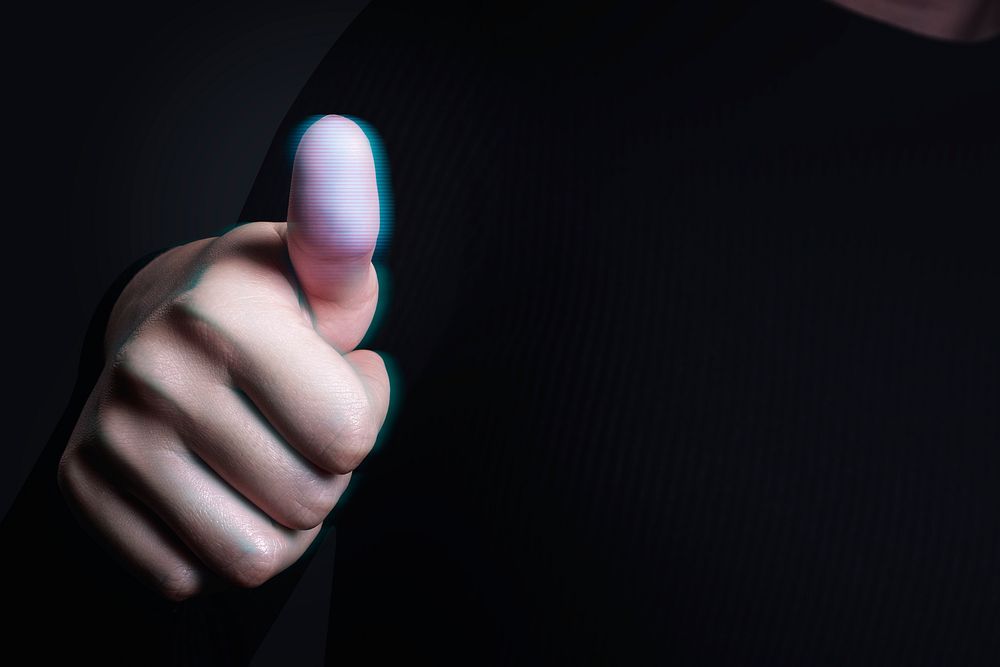 Thumbs up hand gesture fingerprint scanning biometric security technology