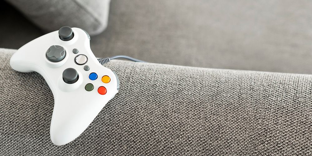 Game console on the couch banner