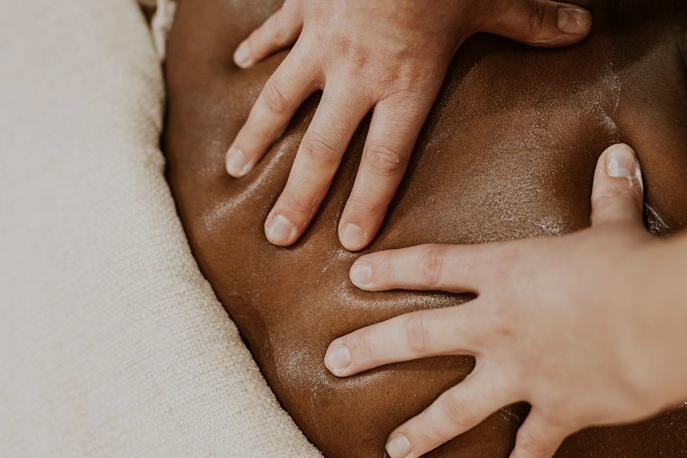 Hands massaging skin, spa, wellness concept
