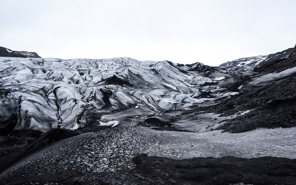 A view of the glaciers on a mountain in Sólheimajökulll. Original public domain image from Wikimedia Commons