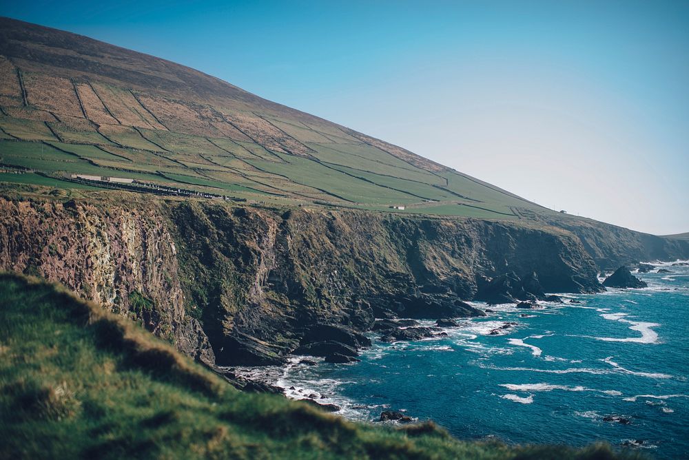 A patchwork of fields on a tall cliff in Dingle. Original public domain image from Wikimedia Commons