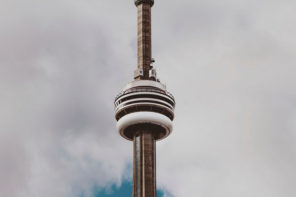 Toronto control tower in front of clouds. Original public domain image from Wikimedia Commons