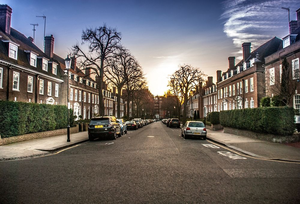 A quiet suburban street with terraced houses in Kensington. Original public domain image from Wikimedia Commons