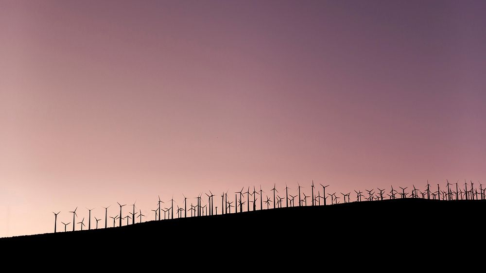 A large wind farm under a violet-hued sky in Palm Springs. Original public domain image from Wikimedia Commons