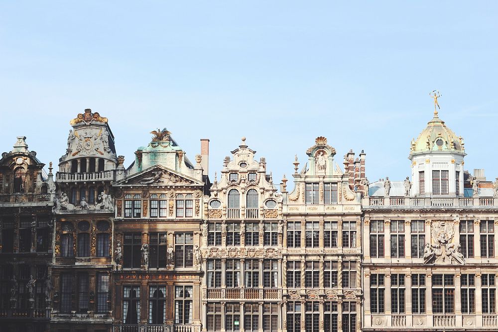 The view facade view of different buildings with different ornate exterior designs in Brussels.. Original public domain…