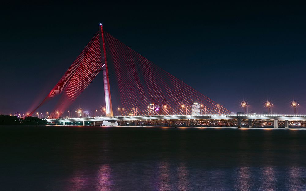Red Night at Tran Thi Ly Bridge. Original public domain image from Wikimedia Commons