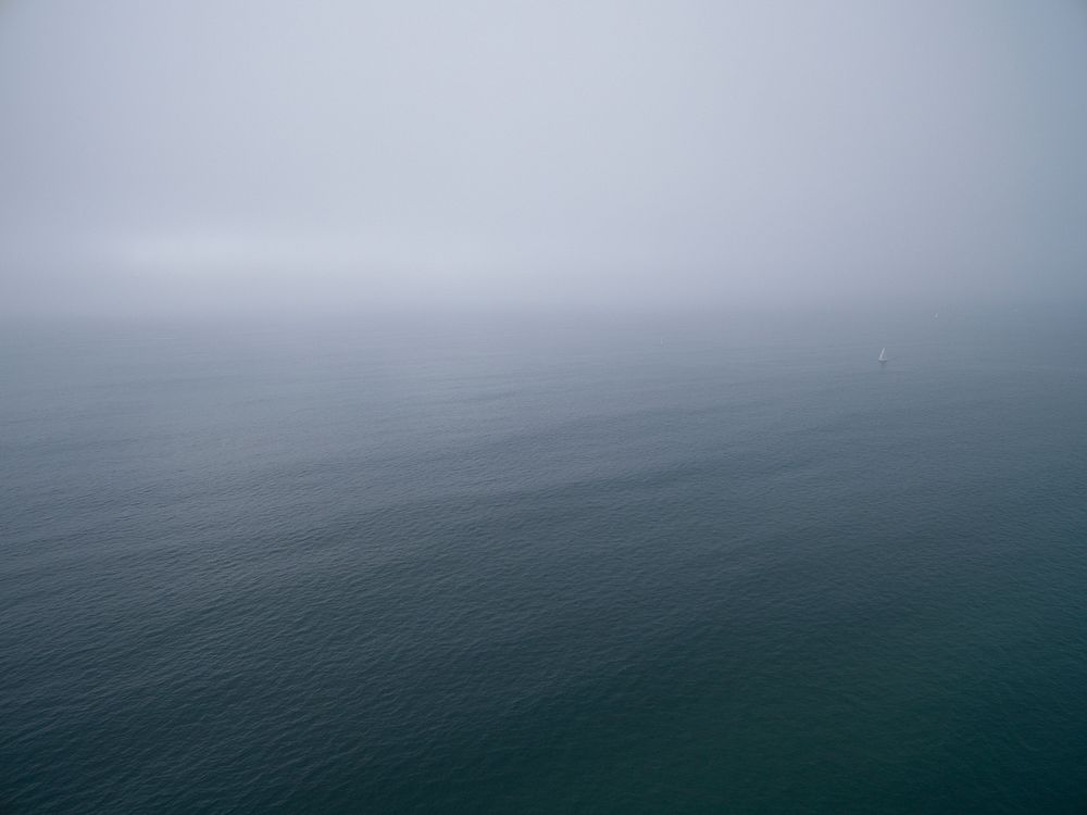 Drone aerial view of the ocean on a foggy day at Redondo Beach. Original public domain image from Wikimedia Commons