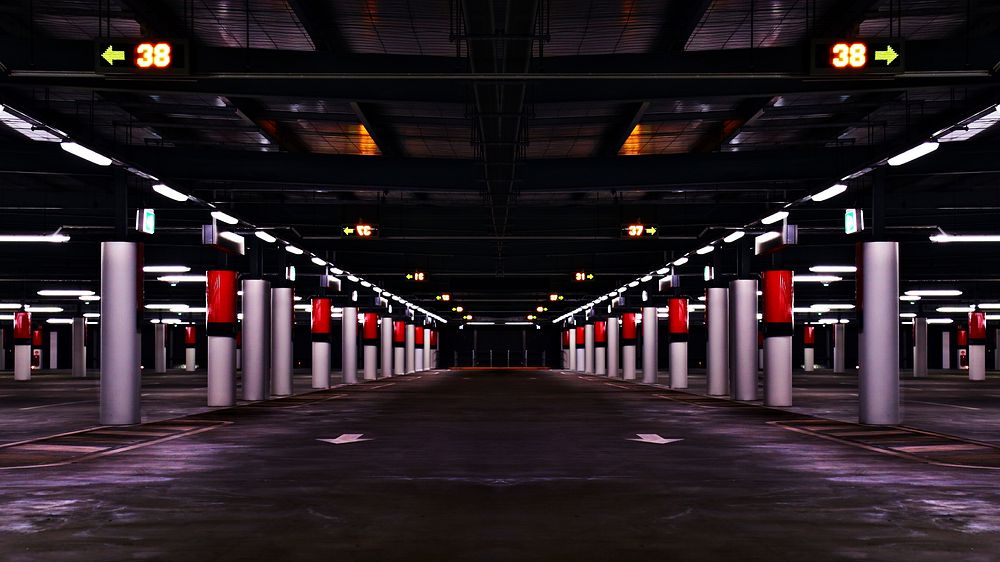 Columns form patterns and lines in an underground parking structure. Original public domain image from Wikimedia Commons